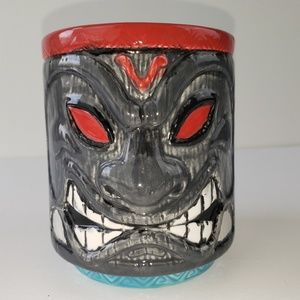 The Potters' Quarter Two face embossed mug